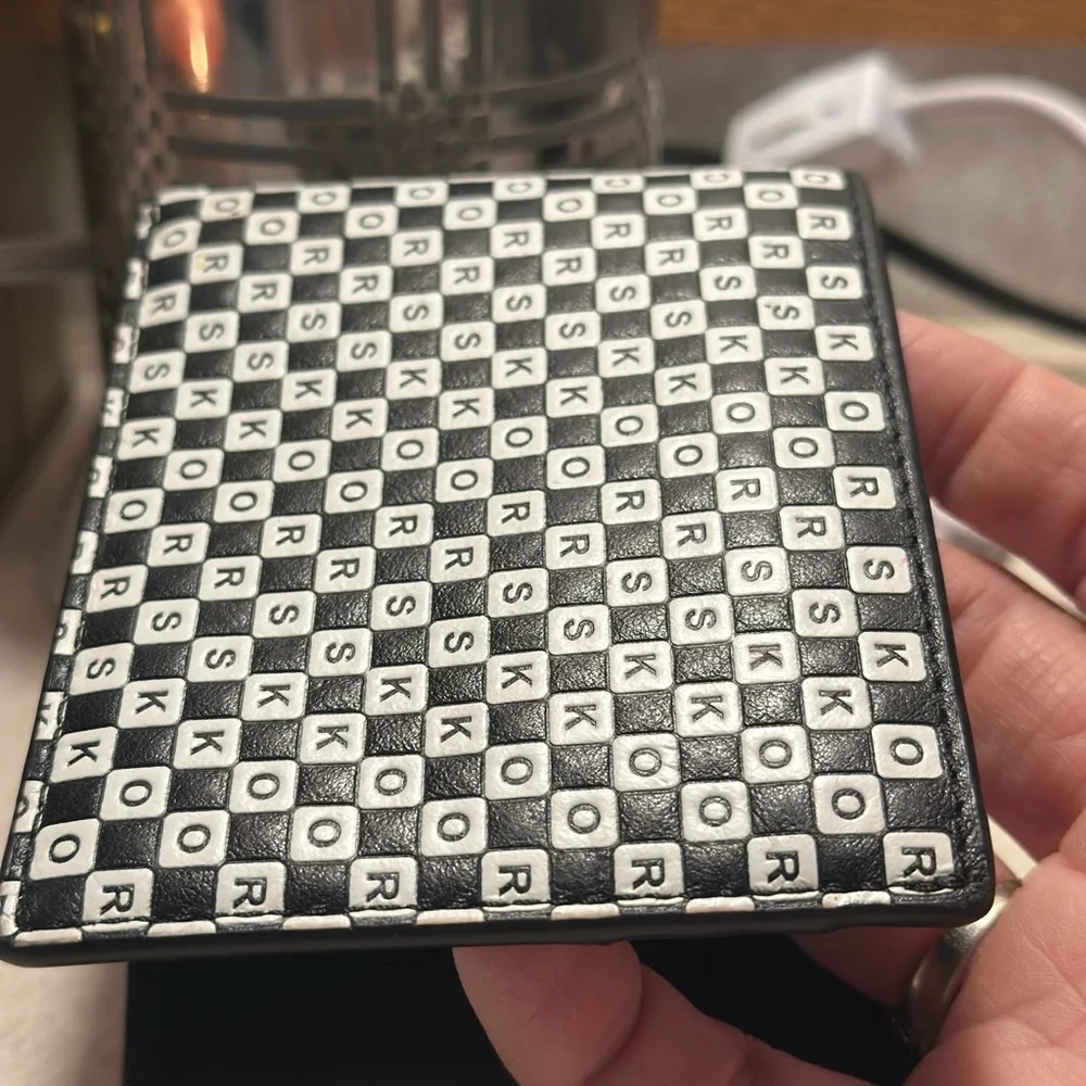 Michael Kors Cooper bilfold bifold wallet. Black and white. Used, mild wear